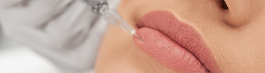 A pair of lips injected with filler to show how lip fillers can ever look natural. 